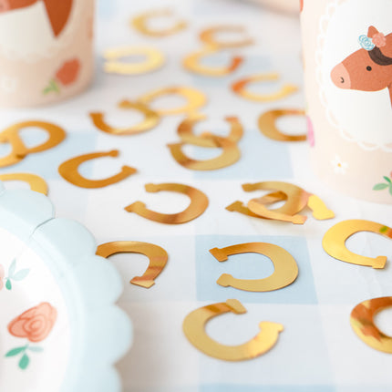 Herraduras de confeti dorado