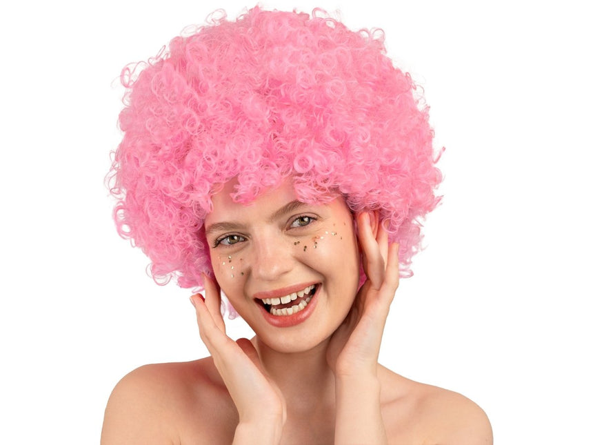 Roze Pruik Afro van Partydeco koop je bij Partywinkel