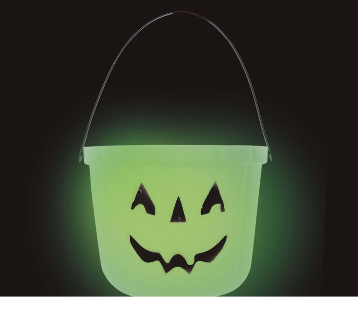 Cubo de calabaza de Halloween que brilla en la oscuridad