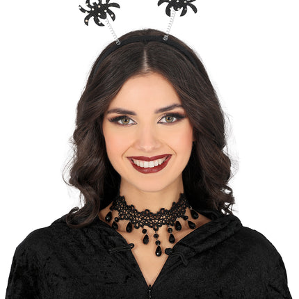 Araña negra de diadema