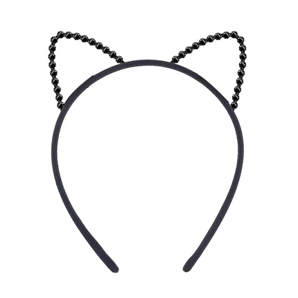 Gato con cinta para el pelo